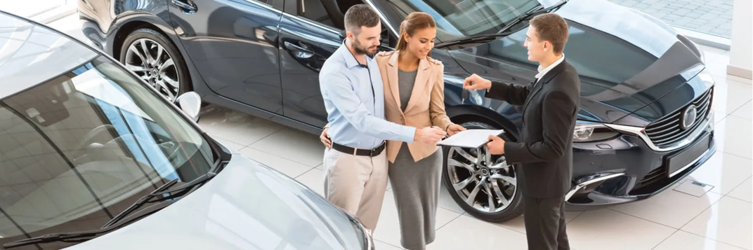 First Financial® auto loan specialists assisting clients with secure vehicle financing - Senior Trademark No. 3532314