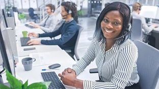Friendly customer support representative available at the Help Desk